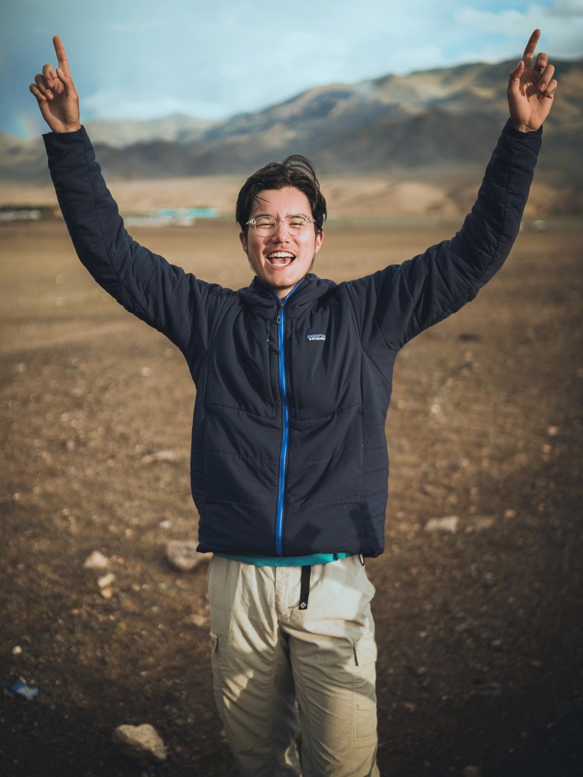Christopher pointing up and smiling!